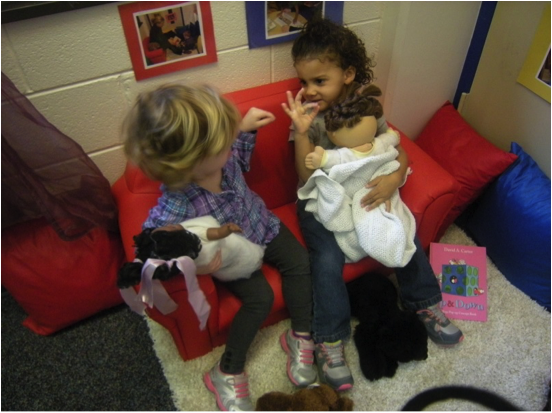 Two children signing to each other
