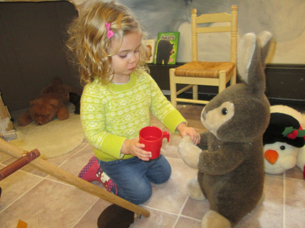 Child with rabbit